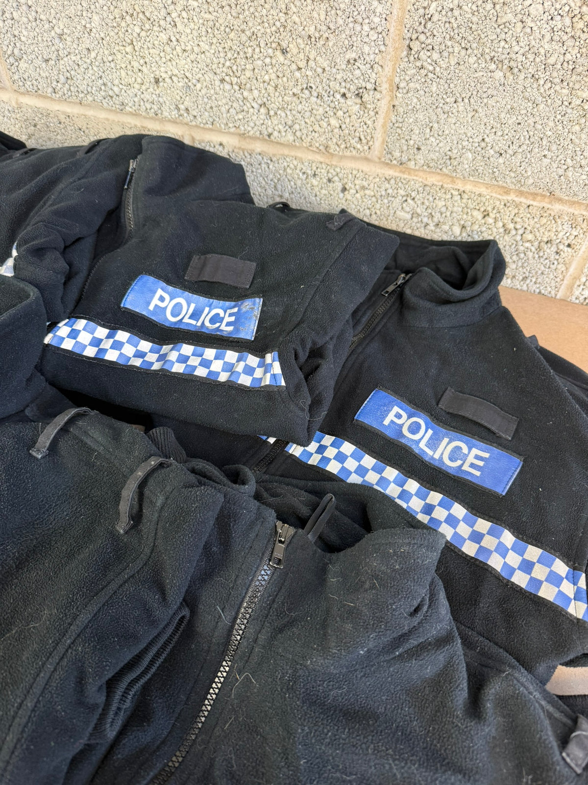 Ex Police Pallet Job Lot Bundle Grade B - Jackets Vests Hats Riot Guards Helmets Boots Fleeces & More!