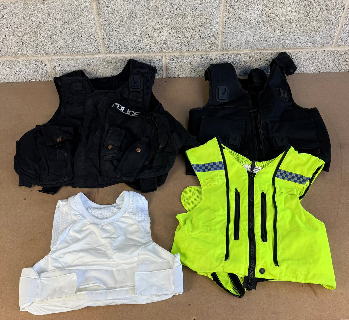 Ex Police Pallet Job Lot Bundle Grade B - Jackets Vests Hats Riot Guards Helmets Boots Fleeces & More!