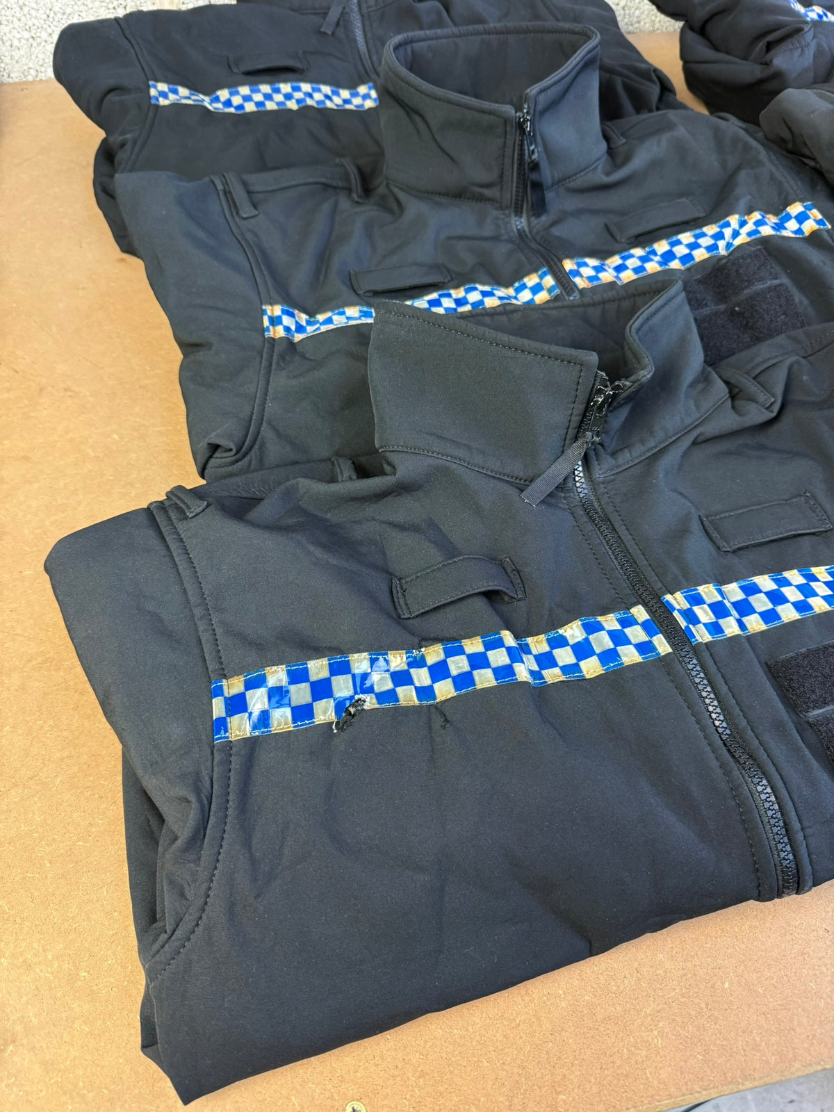 Ex Police Pallet Job Lot Bundle Grade B - Jackets Vests Hats Riot Guards Helmets Boots Fleeces & More!