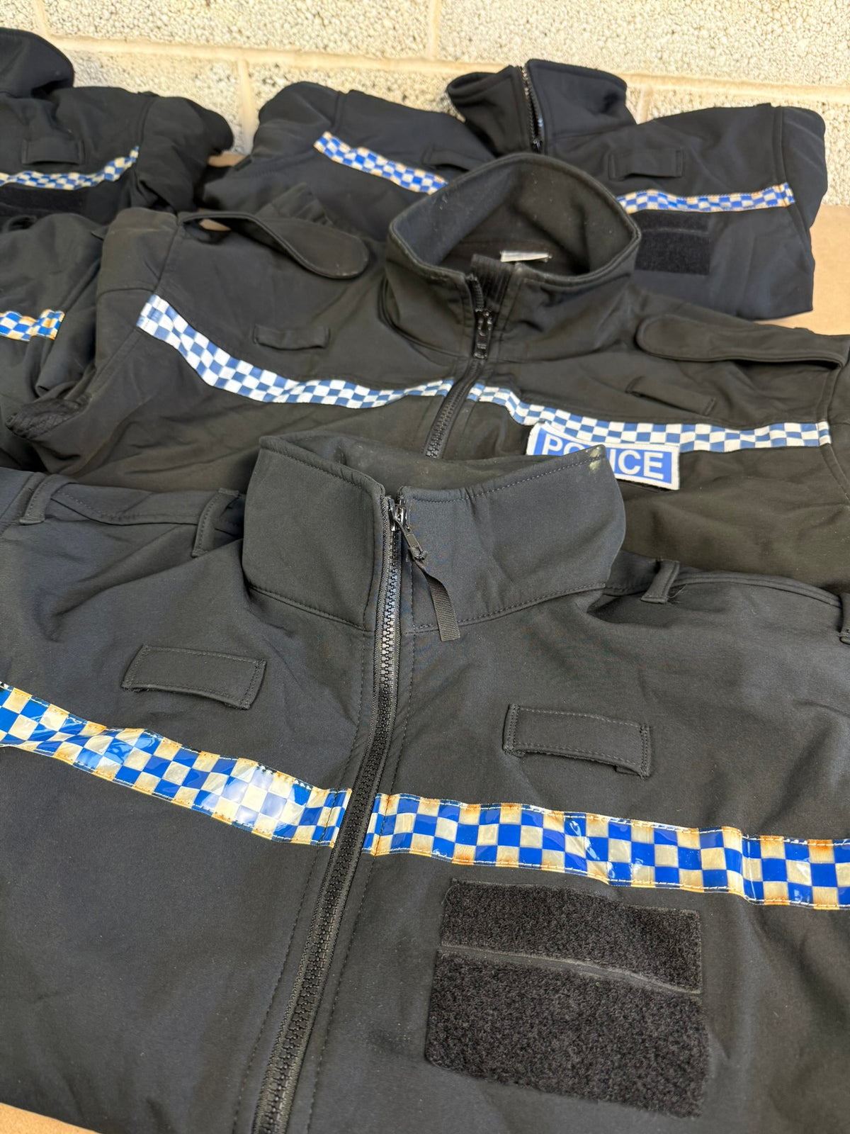 Ex Police Pallet Job Lot Bundle Grade B - Jackets Vests Hats Riot Guards Helmets Boots Fleeces & More!