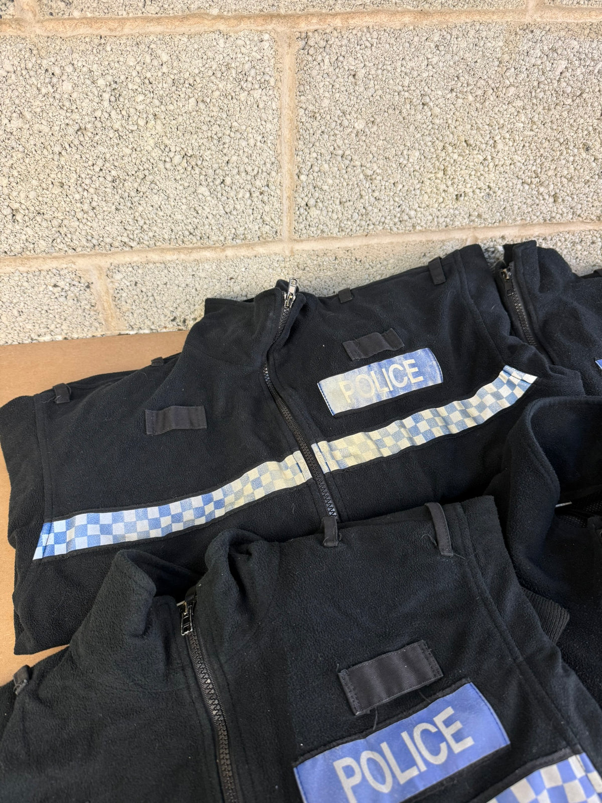 Ex Police Pallet Job Lot Bundle Grade B - Jackets Vests Hats Riot Guards Helmets Boots Fleeces & More!